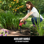 Photo of CRAFTSMAN cordless drill CMCA320C1 used outdoors for gardening, showing auxiliary handle feature.