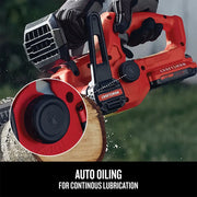 Craftsman cordless chainsaw CMCCS610D1 auto oiling feature closeup during log cutting outdoors.