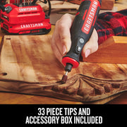 Photo of Craftsman CMCE030B rotary tool sanding wood detail, with red Craftsman battery packs in background.