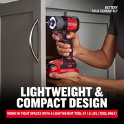 Photo of Craftsman cordless impact driver CMCF610B held near cabinet, red and black design, battery not included.