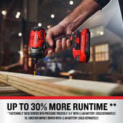Photo of Craftsman cordless impact driver CMCF813B in use driving a screw into wood, showcasing tool’s side profile.