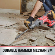 Photo of Craftsman CMCH234B rotary hammer being used to break tile, close-up of tool and gloved hands.