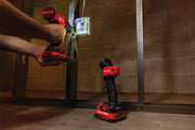 Photo of Craftsman cordless LED work light CMCL020B lighting an electrical box during installation, shown in a workshop.