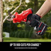 Photo of Craftsman CMCPR320C1 cordless pruner cutting a tree branch, red and black tool held with gloves, outdoor setting.