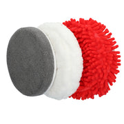 Three photography cleaning pads are shown stacked together. The pads have different textures and colors: one is gray and flat, another is white and fluffy, and the third is red with a shaggy, noodle-like surface.