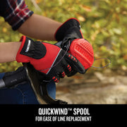 Photo of CRAFTSMAN CMCST920B string trimmer with Quickwind spool feature, held by gloved hands outdoors.