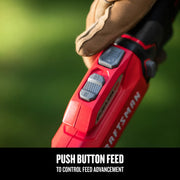 Close-up of Craftsman CMCST930P1 graphics showing push button feed control with glove hand, outdoor background.