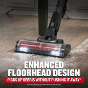 CRAFTSMAN CMCVS501M1 vacuum floorhead with LED lights cleaning debris on wood floor, angled view.