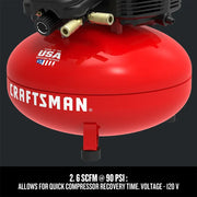 Photo of Craftsman red air compressor, pancake style, partial side view, SKU CMEC6150K, visible brand logo.