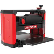 Photo of Craftsman planer CMEW320 in red and black, angled view on white background, woodworking power tool.