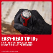 Gloved hand holding a screwdriver with an easy-read tip ID marking on the end. Red and black handle shown.