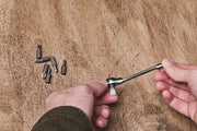 Photo of CRAFTSMAN CMHT68008 ratchet screwdriver with bits shown on wooden surface.