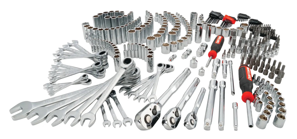 Photo of CRAFTSMAN tool set with ratchets, sockets, wrenches, screwdrivers, SKU CMMT12039, on white background.