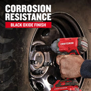 Photo of Craftsman impact driver used on vehicle wheel, showing black oxide finish. CMMT16062.