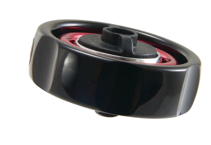Photo of Craftsman ratchet head, black and red color, SKU CMMT86004, tool part, angled view.