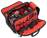 Photo of CRAFTSMAN tool bag with hand tools and drill, red interior, SKU CMST21450, front angle.