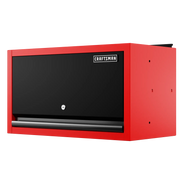 A red and black wall-mounted storage cabinet with a lockable front door and the CRAFTSMAN logo, designed for organizing tools or equipment.
