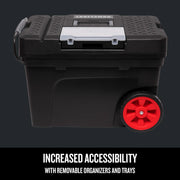 Photo of Craftsman rolling tool box CMST33026, black with large red wheels, top handle, and front organizer tray, side angle.