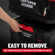 Photo of CRAFTSMAN TRADESTACK CMST60560 black and red toolbox with hand using one-touch release latch.