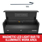 Photo of Craftsman tool chest with SKU CMST98261BK, showing magnetic LED light bar kit above open black workbench.