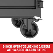 Craftsman CMST98262BK black cabinet with 6-inch over-toe locking casters, side angle view.