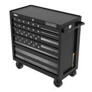 A black rolling tool chest with five drawers, featuring an American flag design in grayscale on the front. The brand name 'Craftsman' is visible on the top drawer. The chest has casters for mobility and a side handle.