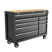 A black metal rolling tool chest with multiple drawers and a light wood top, featuring caster wheels and a lock on the upper drawer. The front displays logo labels including 'Craftsman' and a small USA emblem.