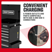 Craftsman CMSTUC06BK tool chest with open lid, showing side panel with 6 power outlets and USB ports, close-up of hand plugging in USB-C.