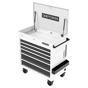 A white Craftsman rolling tool chest with multiple black drawers, an open top compartment, and caster wheels.