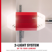 Photo of CRAFTSMAN garage door opener model CMXC1220 with red and white housing, WiFi and Bluetooth logos, two illuminated LED lights, front angle.