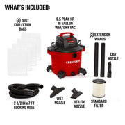 Photo of Craftsman CMXEVBE18595 wet/dry vac with 4 dust bags, two wands, hose, nozzles, and filter on white background.