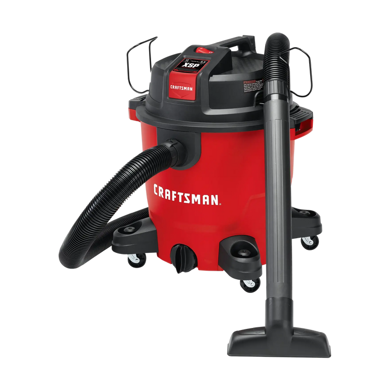 Photo of Craftsman wet/dry vacuum CMXEVCVVJH1211, red drum body, black hose, floor nozzle, white background.