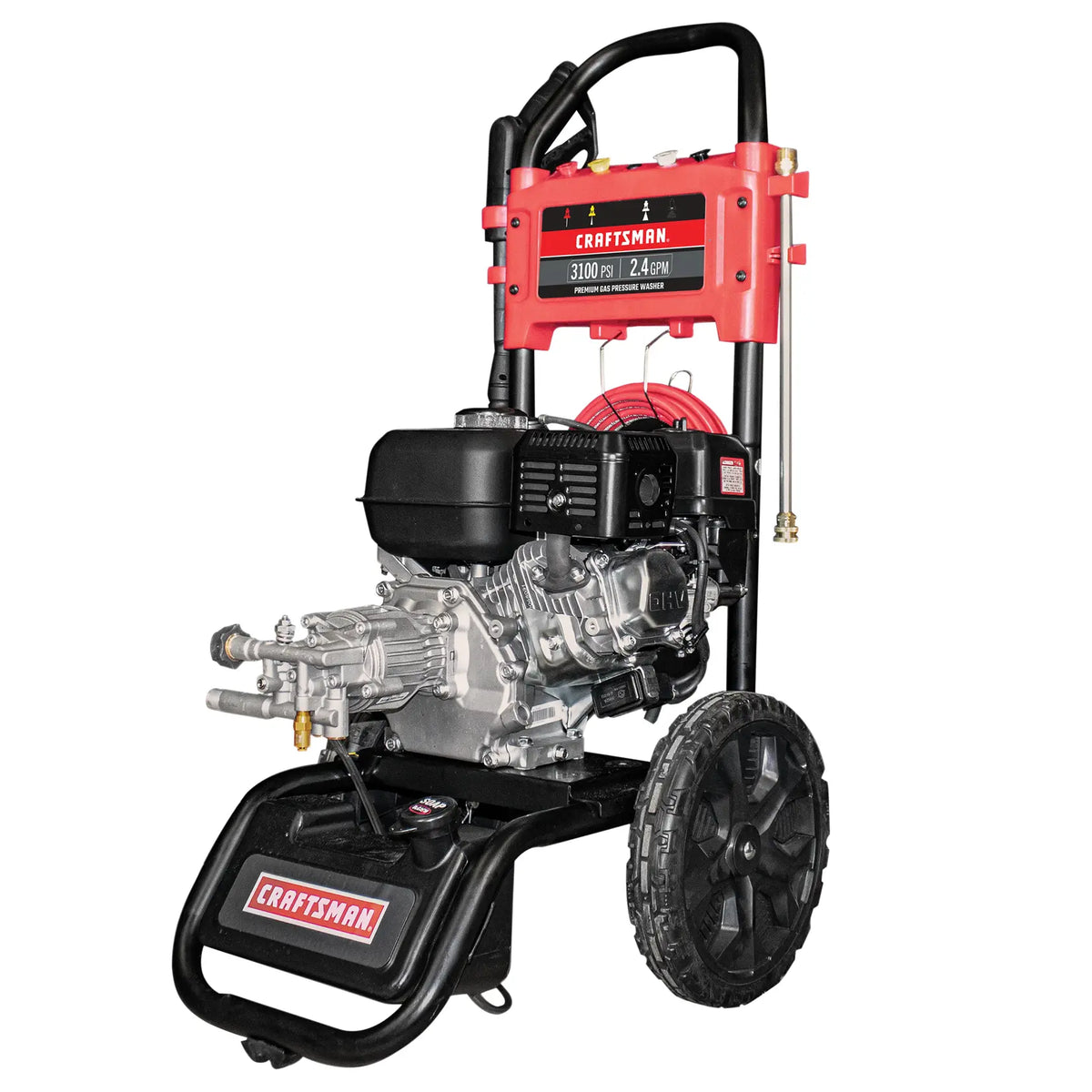 A Craftsman branded gas-powered pressure washer with large wheels, a sturdy black metal frame, a red hose reel, and a black engine. The pressure washer label indicates 3100 PSI and 2.4 GPM.
