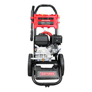 A red and black Craftsman-branded gas-powered pressure washer with 3100 PSI and 2.4 GPM ratings, shown from the front view. The unit features sturdy wheels, a hose, and a spray gun attached to the side.