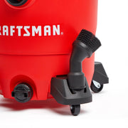 Photo of Craftsman wet/dry vacuum, SKU CMXZVBE27159, showing brush accessory and caster, front-right angle.