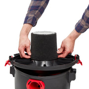 Photo of Craftsman CMXZVBE38765 foam filter being installed in a black wet/dry vacuum, front angle, white background.