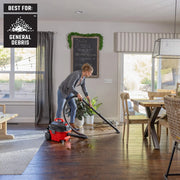 Photo of Craftsman wet/dry vacuum CMXZVBE43271 cleaning general debris on hardwood floor in living room.